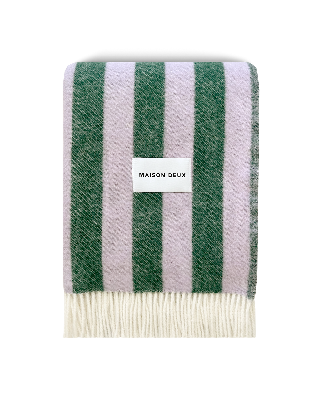 Lilac and green striped wool blanket folded with fringe detail
