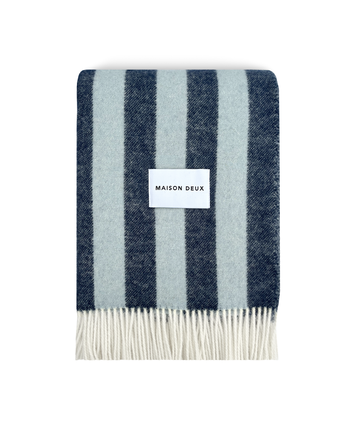 Navy and light blue striped wool blanket folded with fringe detail
