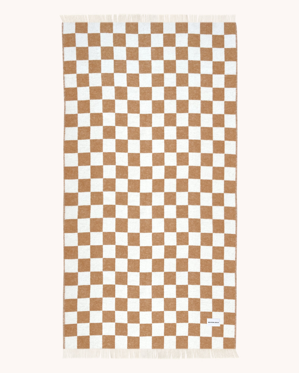 Terracotta and white checkerboard wool throw shown flat, XL size