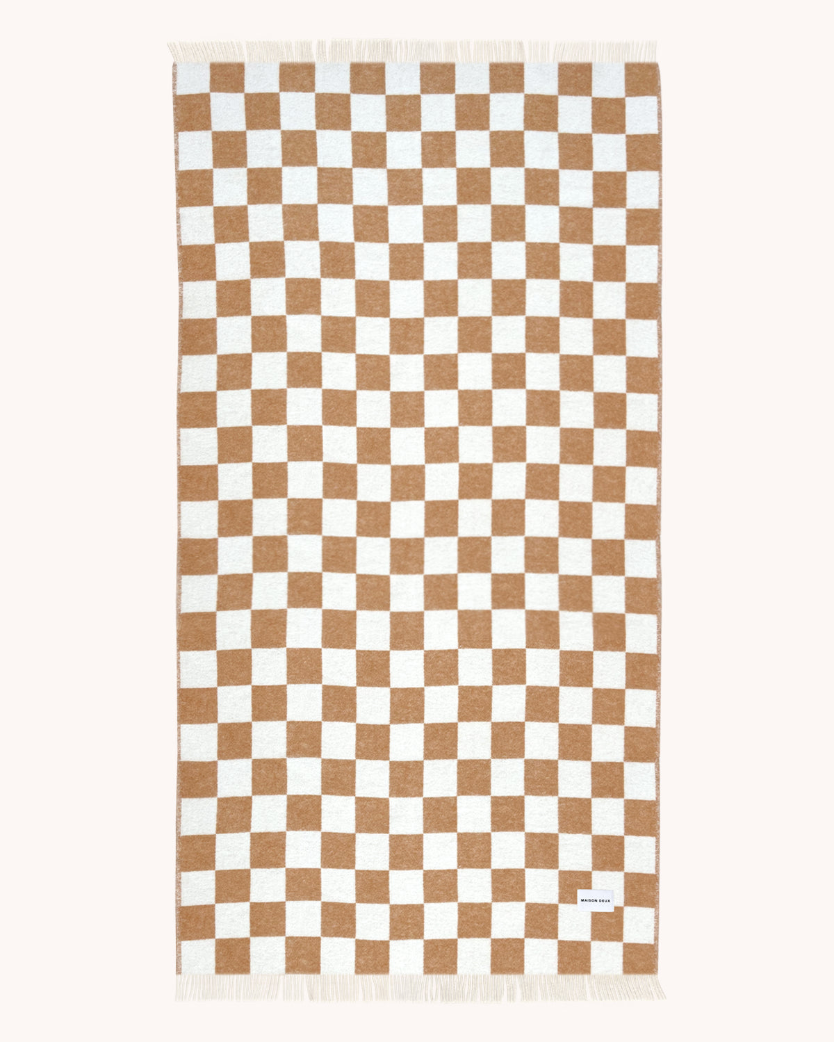 Terracotta and white checkerboard wool throw shown flat, XL size