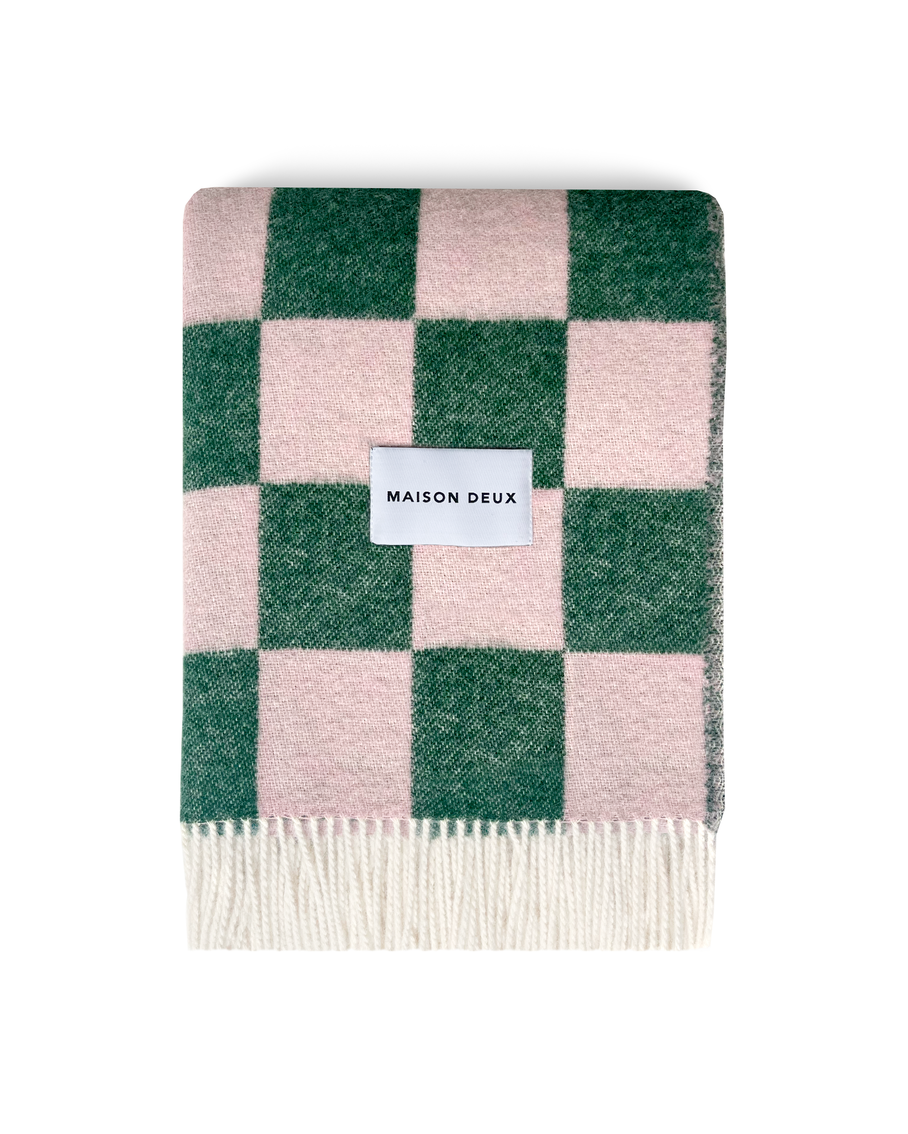 Green and pink checkerboard wool blanket folded with fringe detail
