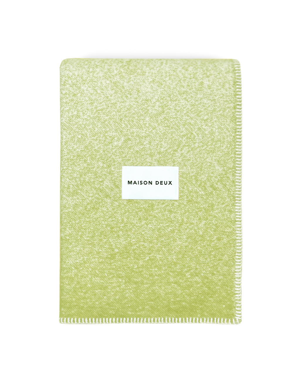 Kiwi green wool blanket folded with stitched edge detail
