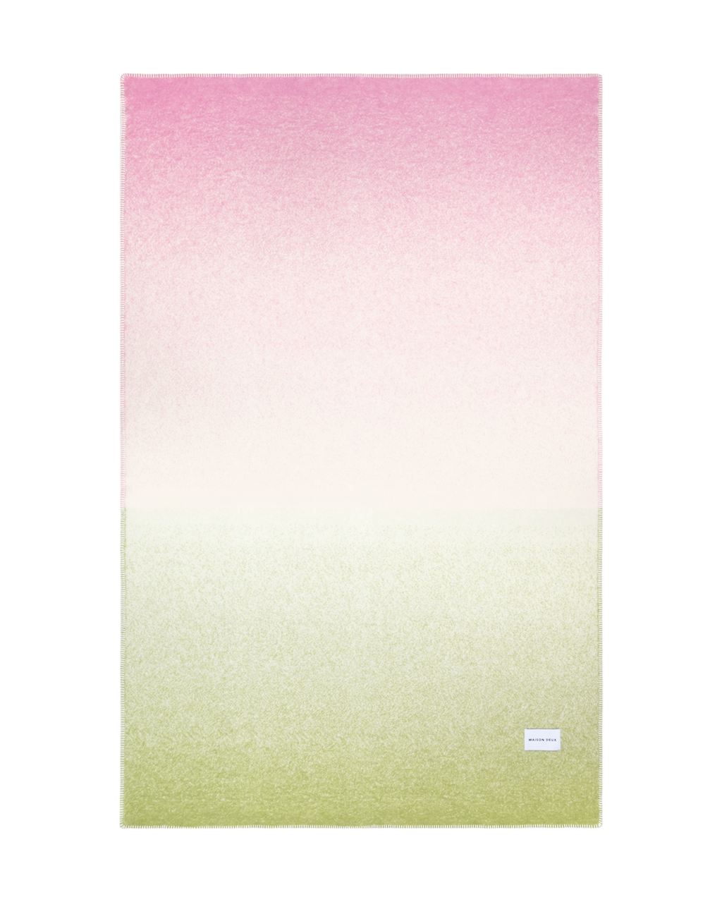 Pink to kiwi green gradient wool throw shown flat
