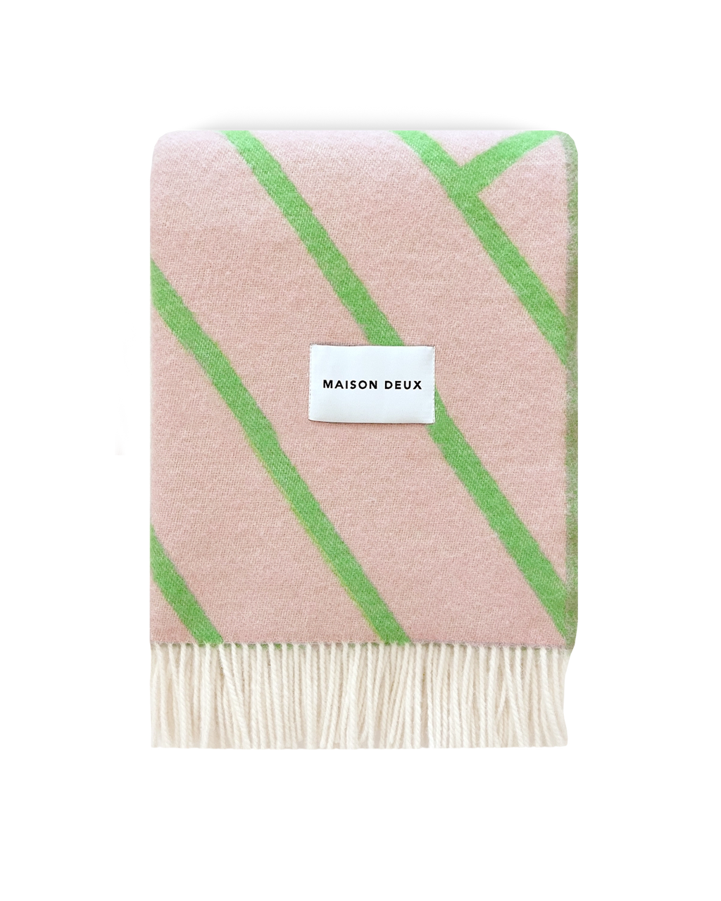 Pink and apple green diagonal striped wool blanket folded with fringe detail
