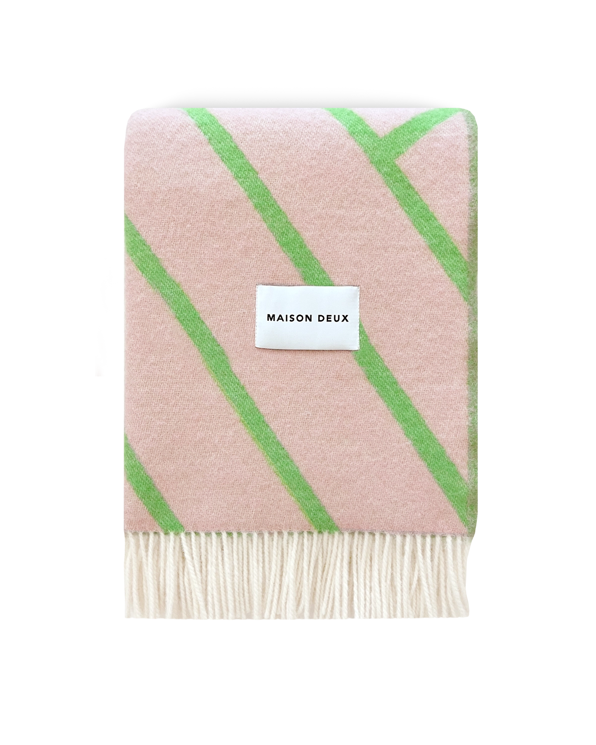 Pink and apple green diagonal striped wool blanket folded with fringe detail
