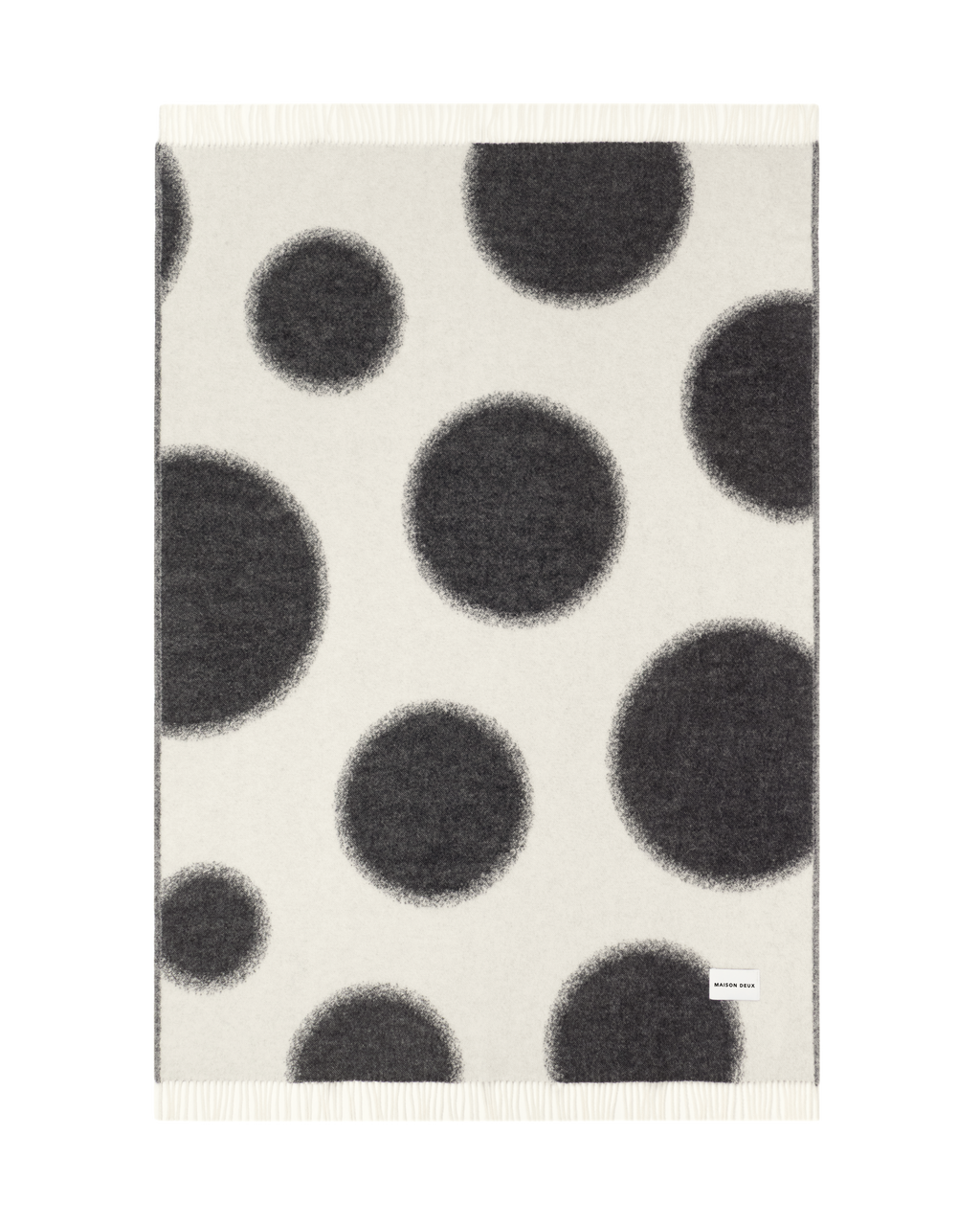 Black and white polka dot wool plaid shown flat
