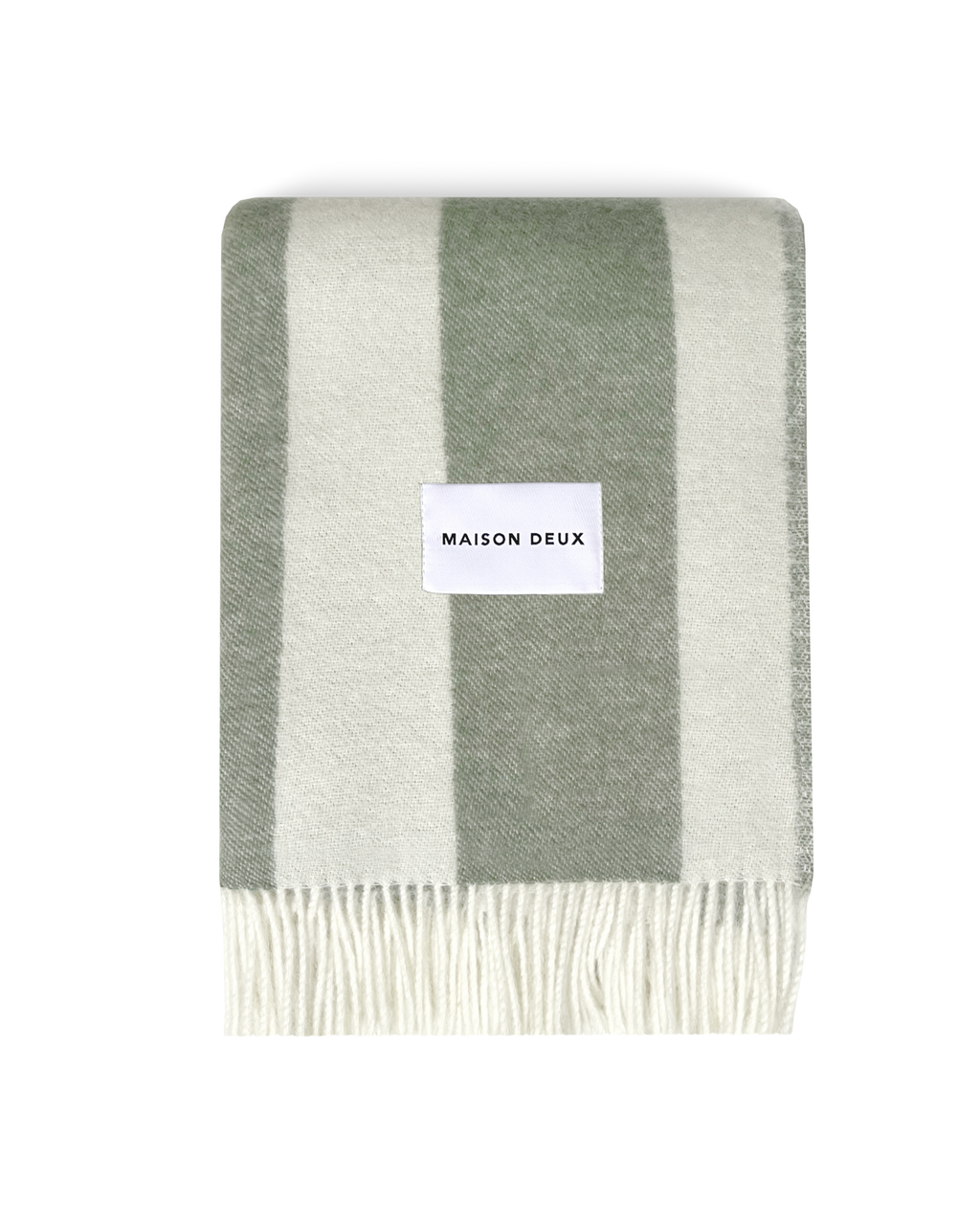 Sage green and white striped wool blanket folded with fringe detail
