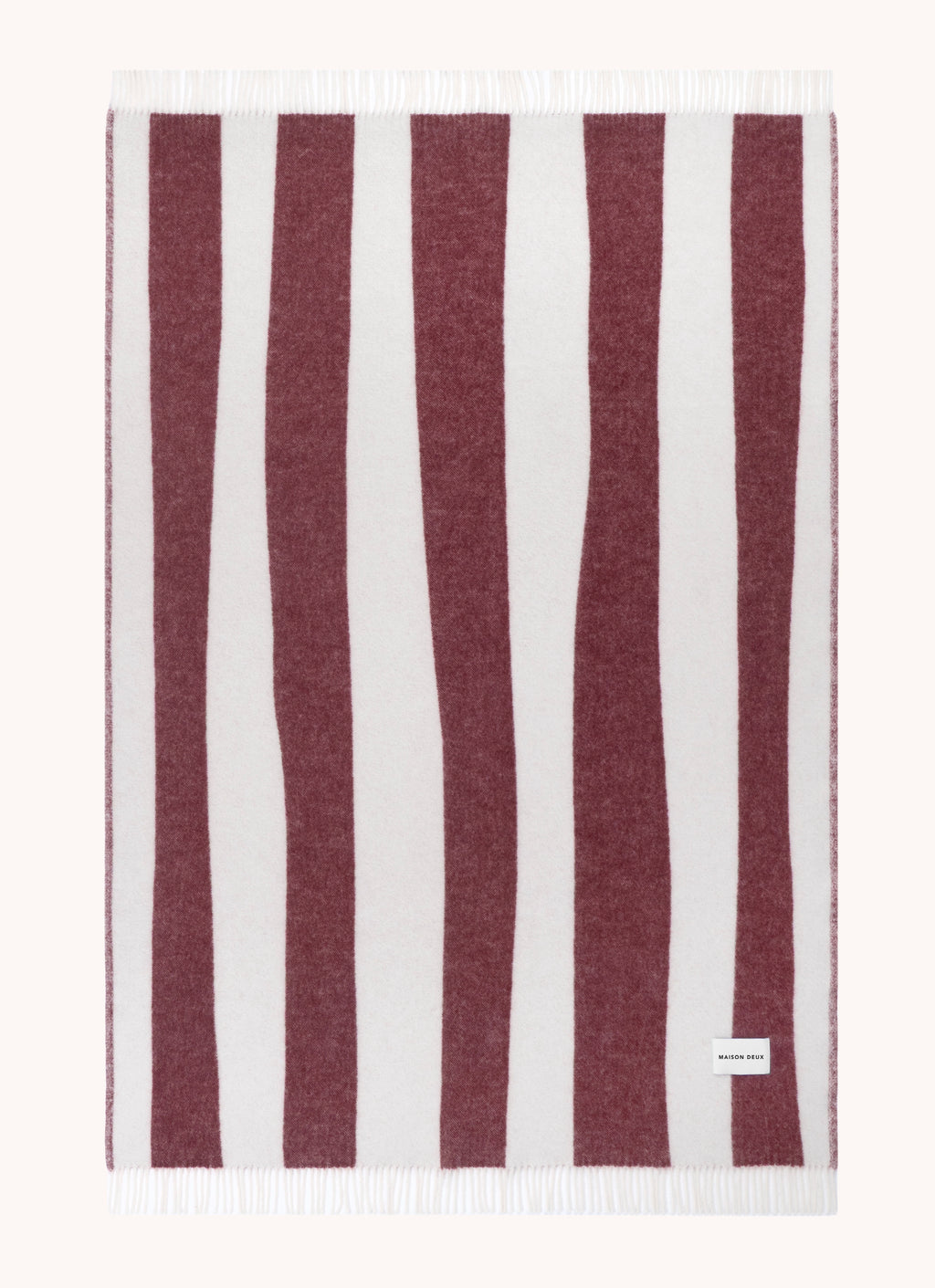Merlot and white striped wool throw shown flat
