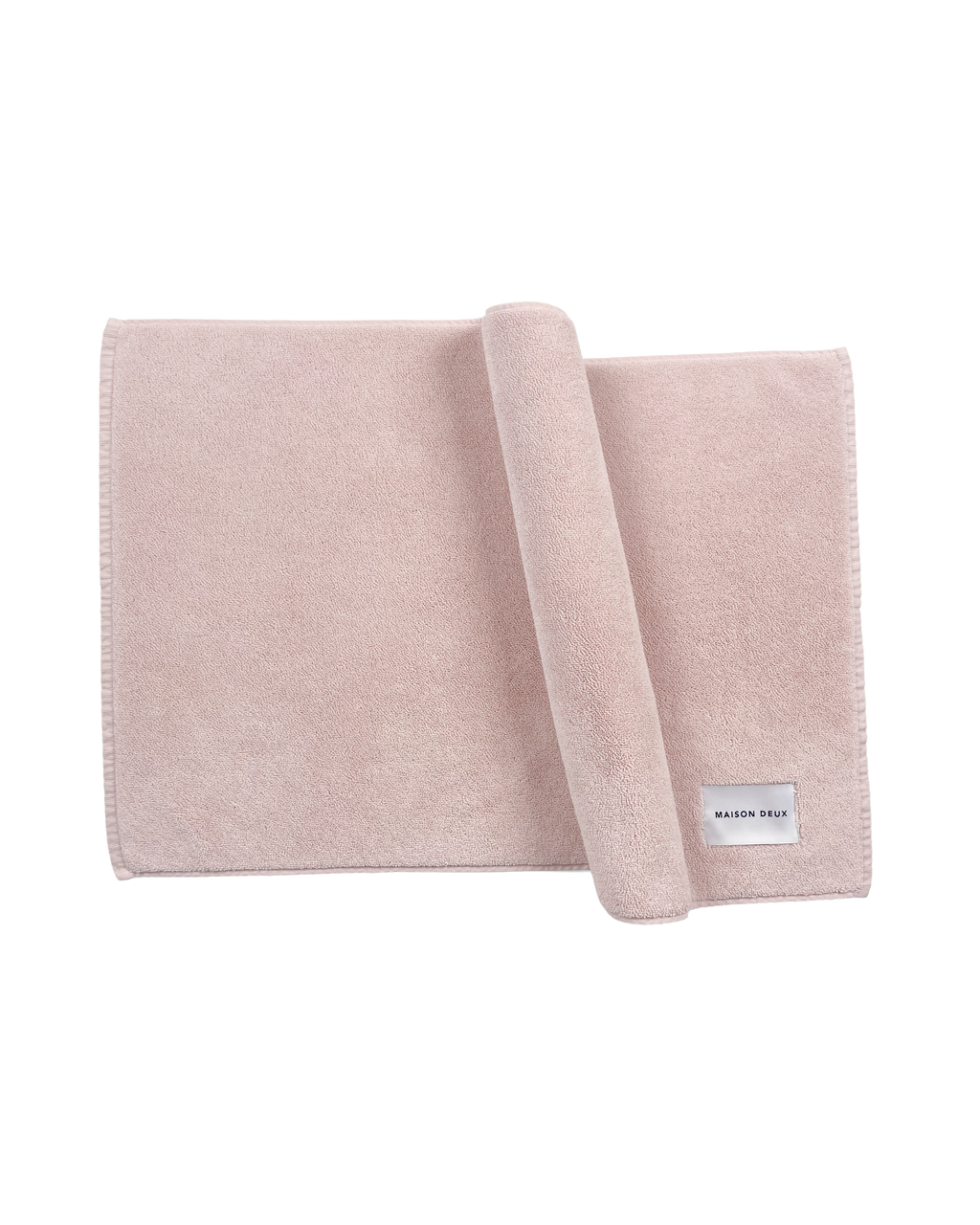 Solid pink organic cotton bath mat