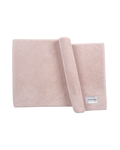 Solid pink organic cotton bath mat