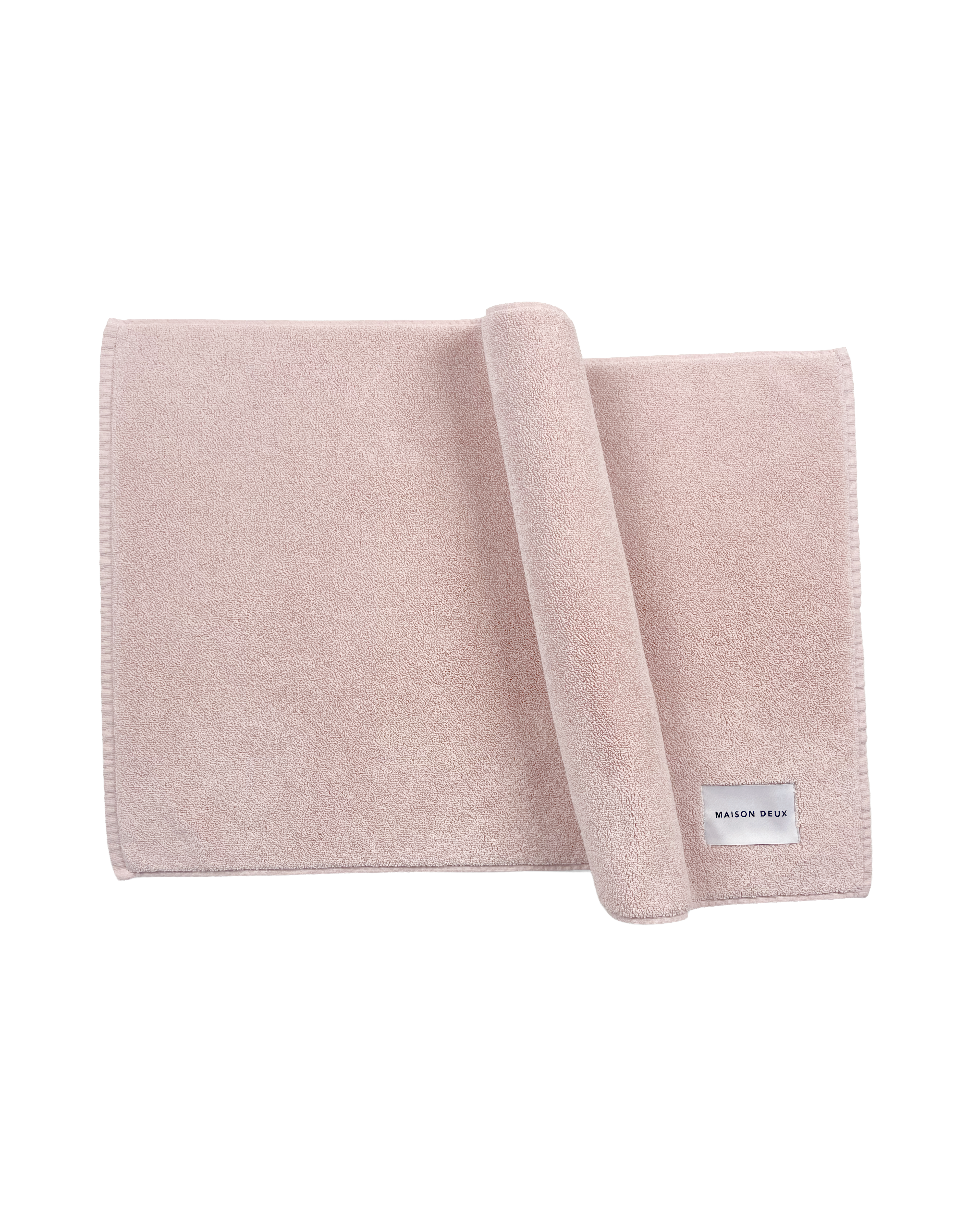 Solid pink organic cotton bath mat