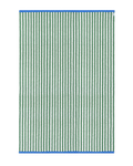 Green and white striped outdoor rug with blue border