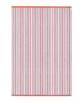 Pink and white striped outdoor rug with coral border