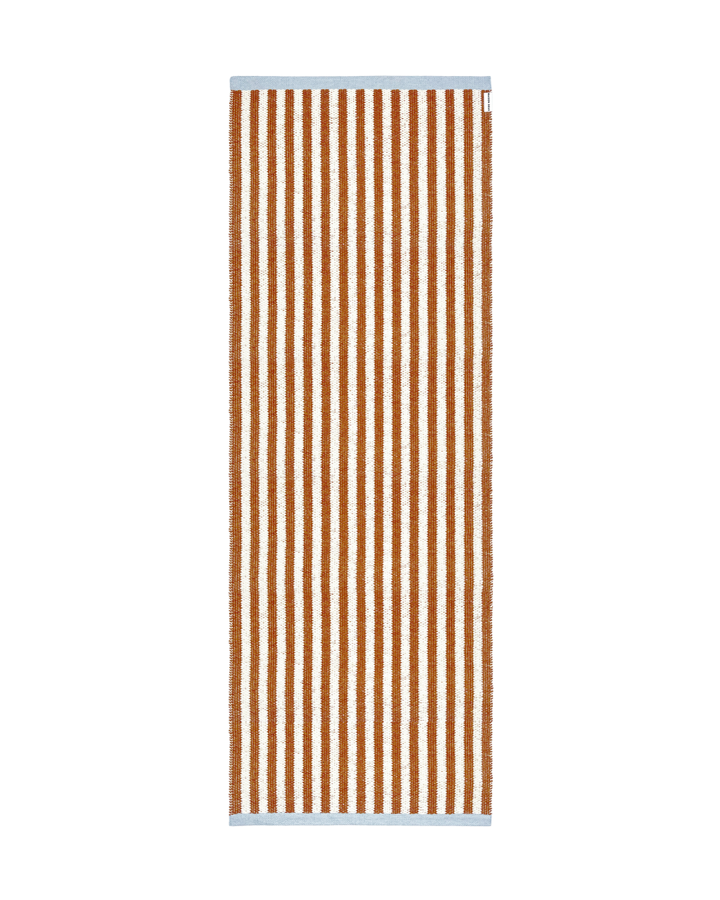 Terracotta orange and white striped rug with blue border, rolled