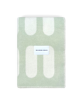 Chill Pill sage green wool throw blanket with plaid pattern and Maison Deux label